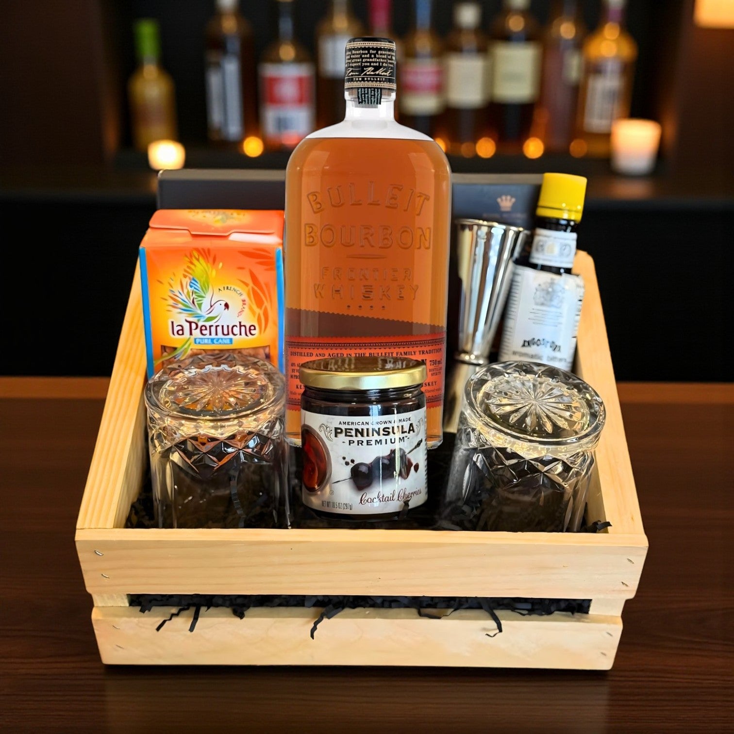 Bulleit Bourbon Old Fashioned Gift Crate featuring engravable whiskey bottle and glasses, bar tools, cherries, bitters, and sugar cubes – Top Bourbon lifestyle photo