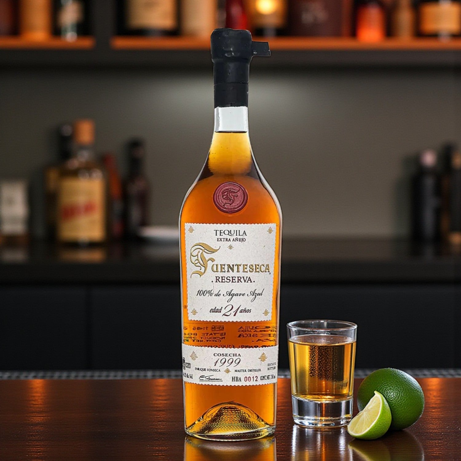 Engraved Fuenteseca Reserva Extra Añejo 21 Year Tequila 750ml bottle with shot glass and lime on polished bar – Top Bourbon lifestyle image