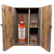 The Macallan 18 Year Sherry Oak in a wooden gift box with two crystal glasses on white