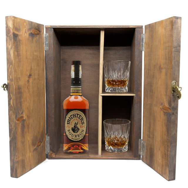 Michter's US*1 Small Batch Bourbon in a wooden gift box with two crystal glasses on white