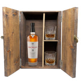 The Macallan 18 Year Double Cask in a wooden gift box with two crystal glasses on white