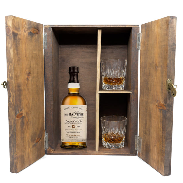 The Balvenie 12 Year DoubleWood in a wooden gift box with two crystal glasses on white