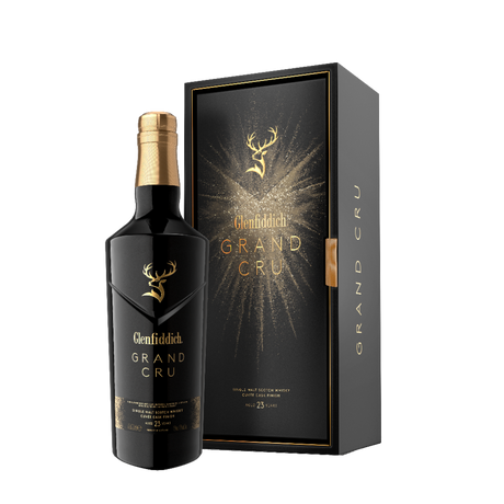 Glenfiddich Grand Cru 23 Year Old bottle with black and gold presentation box on black background