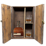 Woodford Reserve Double Oaked in a wooden gift box with two crystal glasses on white