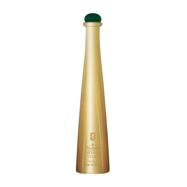 Tall gold Don Julio 1942 FIFA World Cup 2026 limited-edition tequila bottle with green cap; roasted agave, vanilla and oak.
