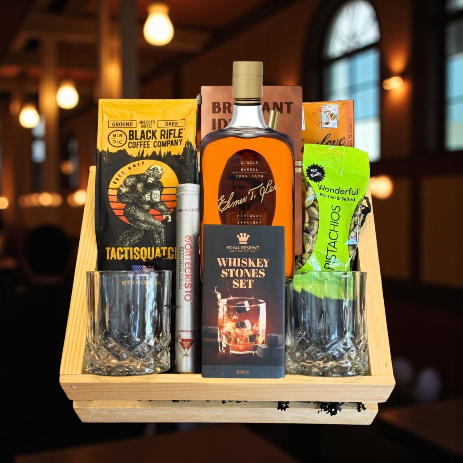 Engravable Elmer T. Lee Single Barrel Bourbon Top Shelf Gift Crate displayed in a warm, elegant setting with whiskey, coffee, cigar and glasses – handcrafted bourbon crate from Top Bourbon