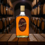 Elmer T. Lee Single Barrel Bourbon bottle displayed in a wooden rackhouse setting – elegant Kentucky bourbon photograph for Top Bourbon