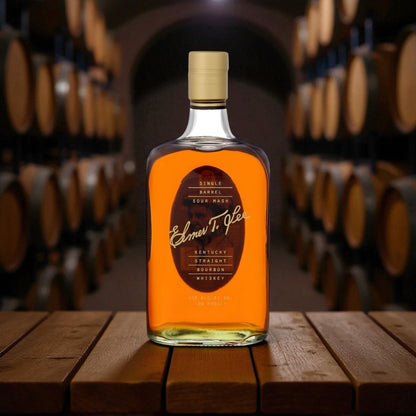 Elmer T. Lee Single Barrel Bourbon bottle displayed in a wooden rackhouse setting – elegant Kentucky bourbon photograph for Top Bourbon