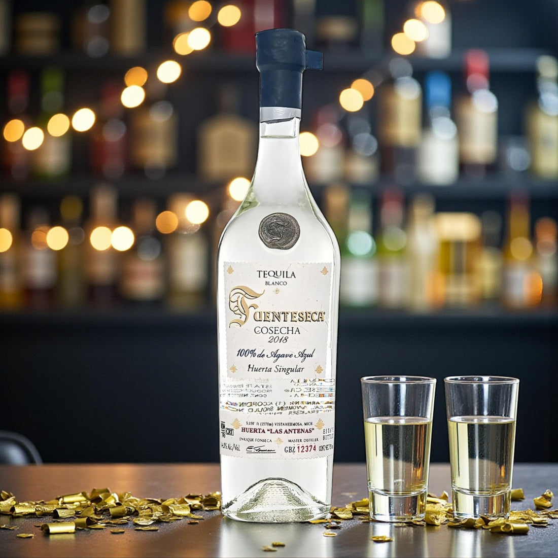 Engravable Fuenteseca Cosecha “Huerta Las Antenas” Blanco Tequila 2018 Limited Release bottle on bar with warm ambient lighting – Top Bourbon lifestyle image