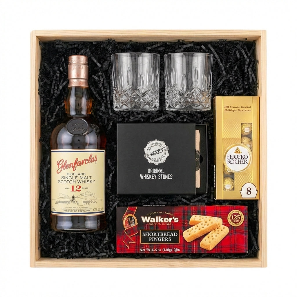 Glenfarclas 12 Year Sherry Cask Single Malt Scotch Whisky gift crate with crystal old fashioned glasses, whiskey stones, Ferrero Rocher chocolates, Walker's shortbread, and natural wood crate with black crinkle fill