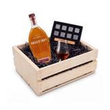 Angel's Envy Port Wine Finished bourbon gift crate with a Glencairn-style tasting glass and a whiskey stones set in a hand-finished wooden crate.