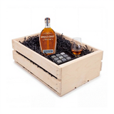 Angel's Envy Triple Oak bourbon gift crate with a Glencairn-style tasting glass and a whiskey stones set in a hand-finished wooden crate.