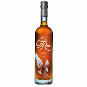 A bottle of Eagle Rare Kentucky Straight Bourbon Whiskey with amber liquid, a silver cap, and a white eagle graphic on a clean white background.