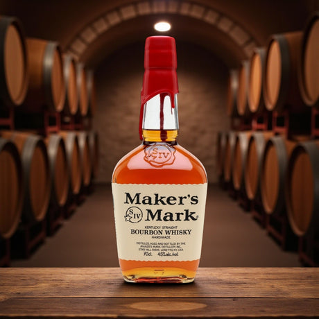 Engravable Maker’s Mark Kentucky Straight Bourbon Whisky bottle with red wax seal in barrel room – Top Bourbon lifestyle image