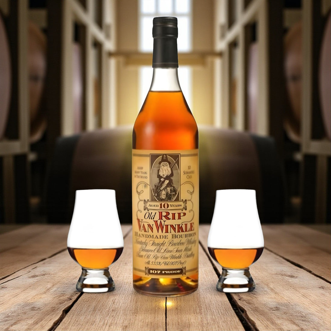 Engravable Old Rip Van Winkle 10 Year Bourbon Gift Set with two Glencairn glasses on rustic wooden table with bourbon barrels – Top Bourbon lifestyle image