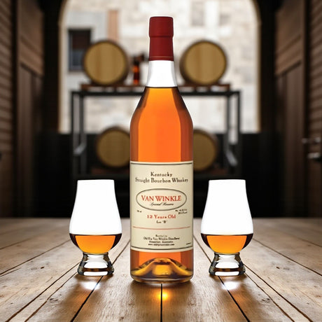 Engravable Pappy Van Winkle Special Reserve 12 Year Lot B Bourbon Gift Set with two Glencairn glasses on wooden barrel table – Top Bourbon lifestyle image