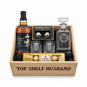 Yamazaki 18 Year Single Malt gift crate with Ferrero Rocher 8-piece chocolates on white background